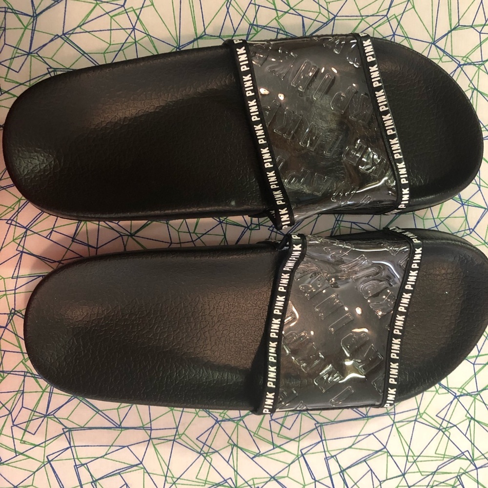 Never worn pink slides